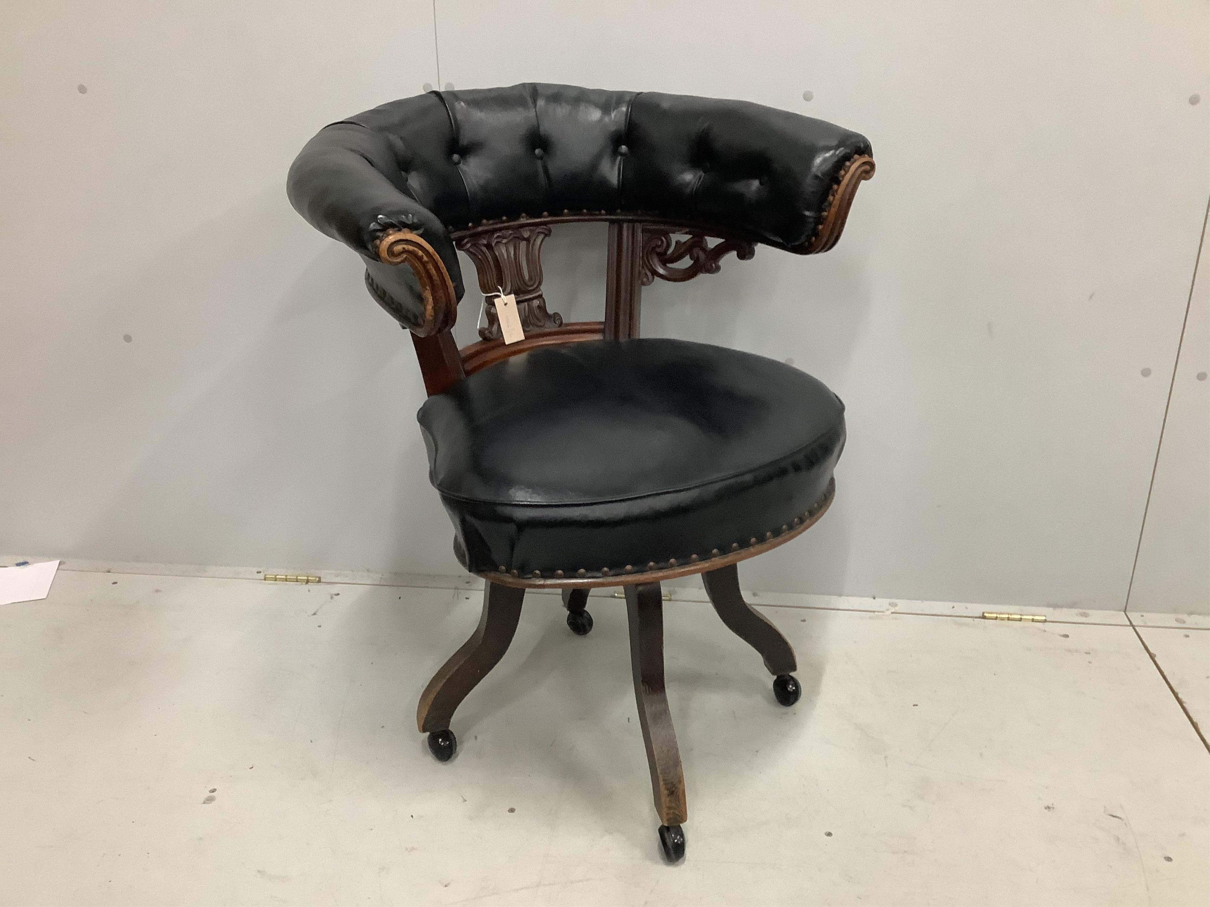 A Victorian mahogany swivel desk chair, width 73cm, depth 53cm, height 92cm. Condition - fair